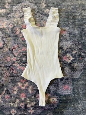 Jolie Cream Ribbed Thong Bodysuit with Ruffle Straps - Like New Size Small
